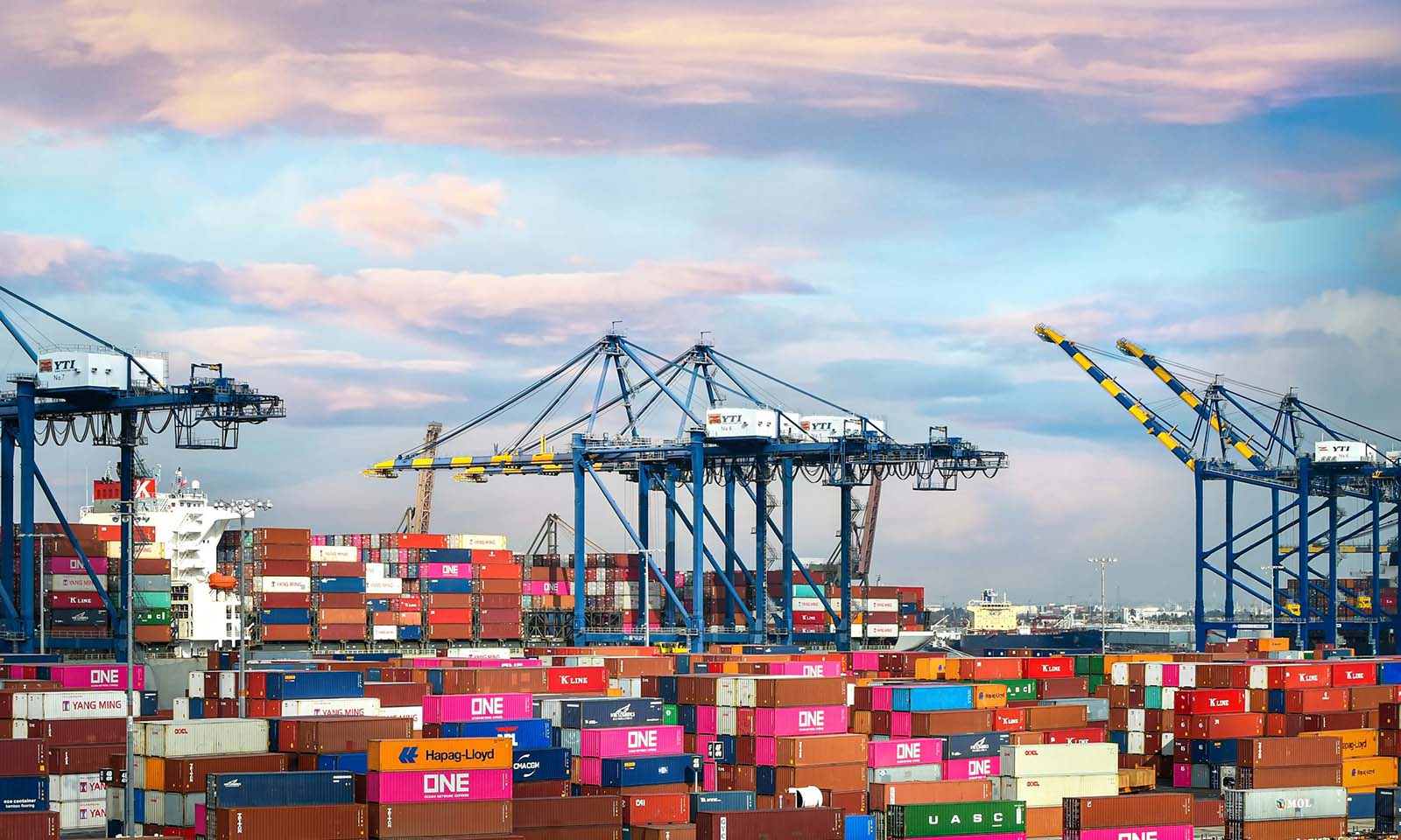 port of los angeles cranes and containers - port activity - commercial real estate